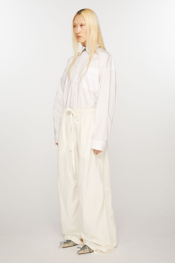 ACNE STUDIOS - RELAXED DRUSTING TROUSERS